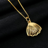 Pendentif perle pétoncle Or 18 carats