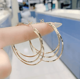 Boucles d'oreilles créoles fine Entrelacée - Plaqué Or 18 Carats Loriele™