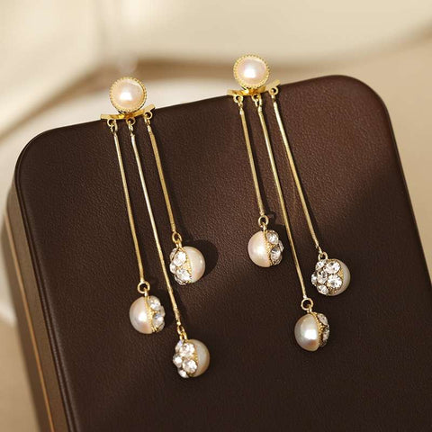 Shiny pearl earrings